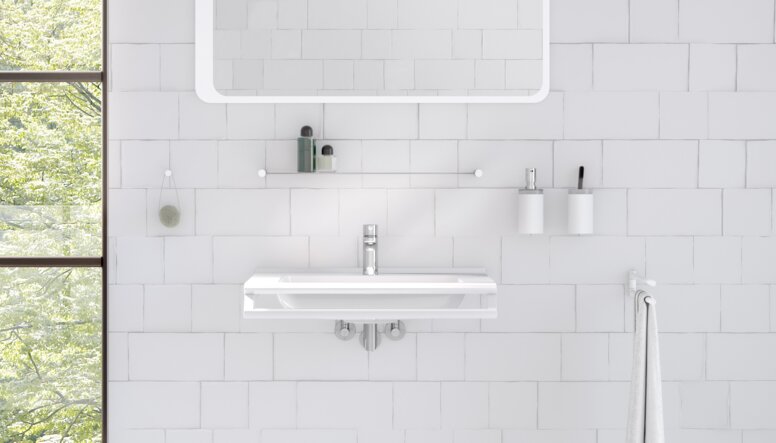 HEWI System 162 Moderne Waschtischsituation mit weißmatten Sanitäraccessoires wie Seifenspender, Handtuchhalter und Ablage