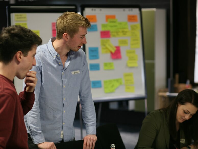 HEWI Innovation Challenge Design 3 participants of the Innovation Challenge exchanging ideas