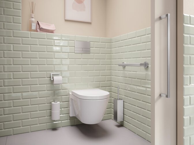HEWI System 900Q stainless steel WC area equipped with toilet brush holder, toilet roll holder and grab rail in matt stainless steel