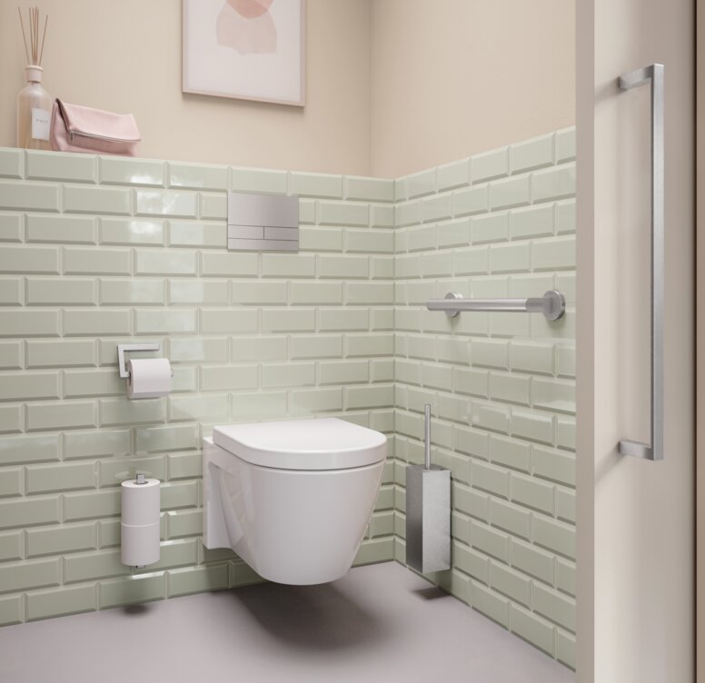 WC-Bereich ausgestattet mit WC-Bürstenhalter, Toilettenpapierhalter und Haltegriff in Edelstahl matt