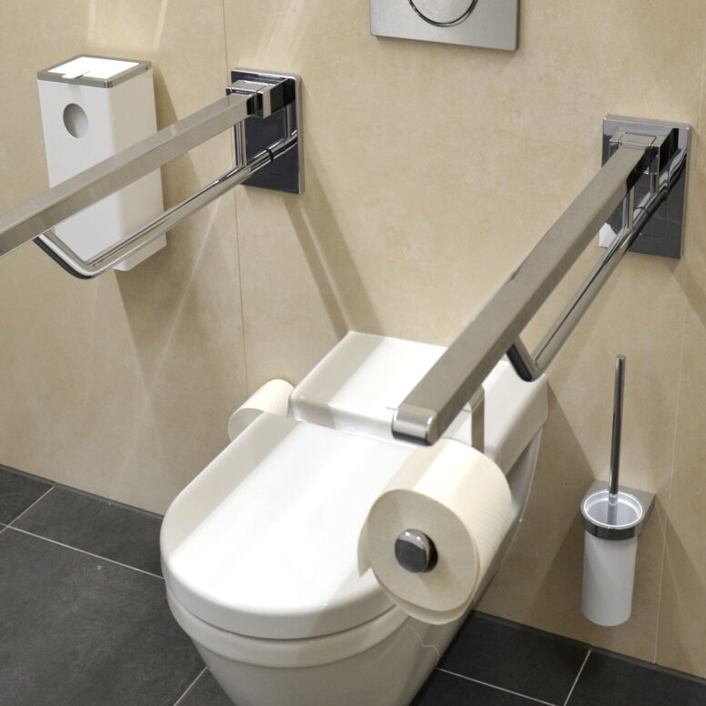 Museum for Architectural Drawings Toilet equipped with folding support handles, toilet brush set and System 800 hygiene waste bin